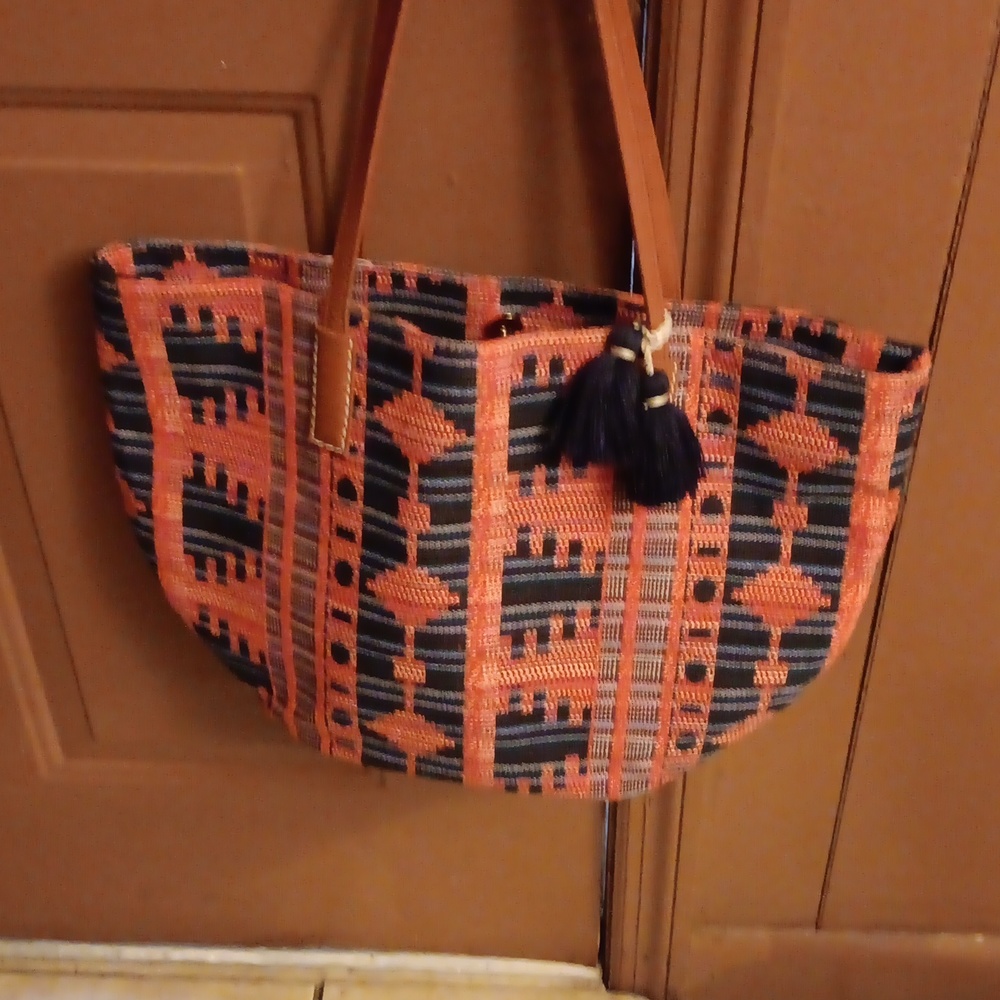 Pretty orange and blue tote bag with inside pocket.